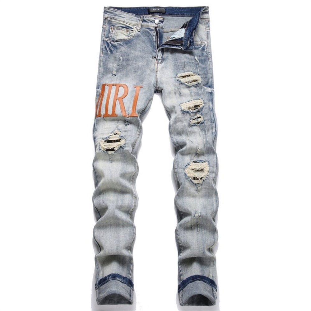 AMIRI Light Blue Distressed Skinny Jeans with Orange Logo